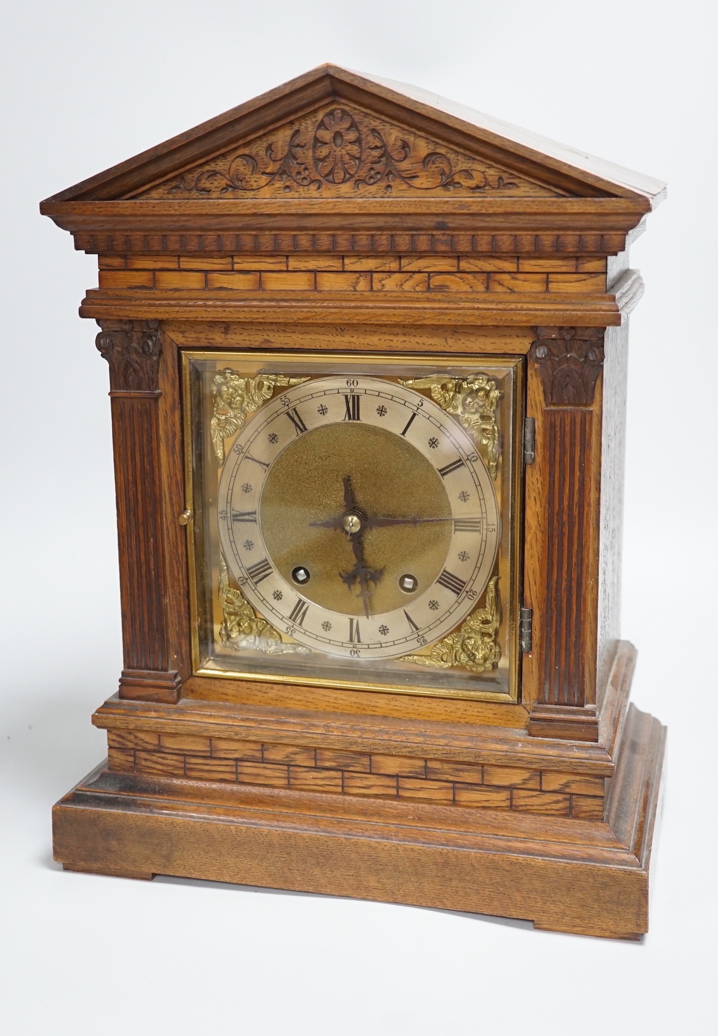 A late 19th century Black Forest oak bracket clock, 40.5cm